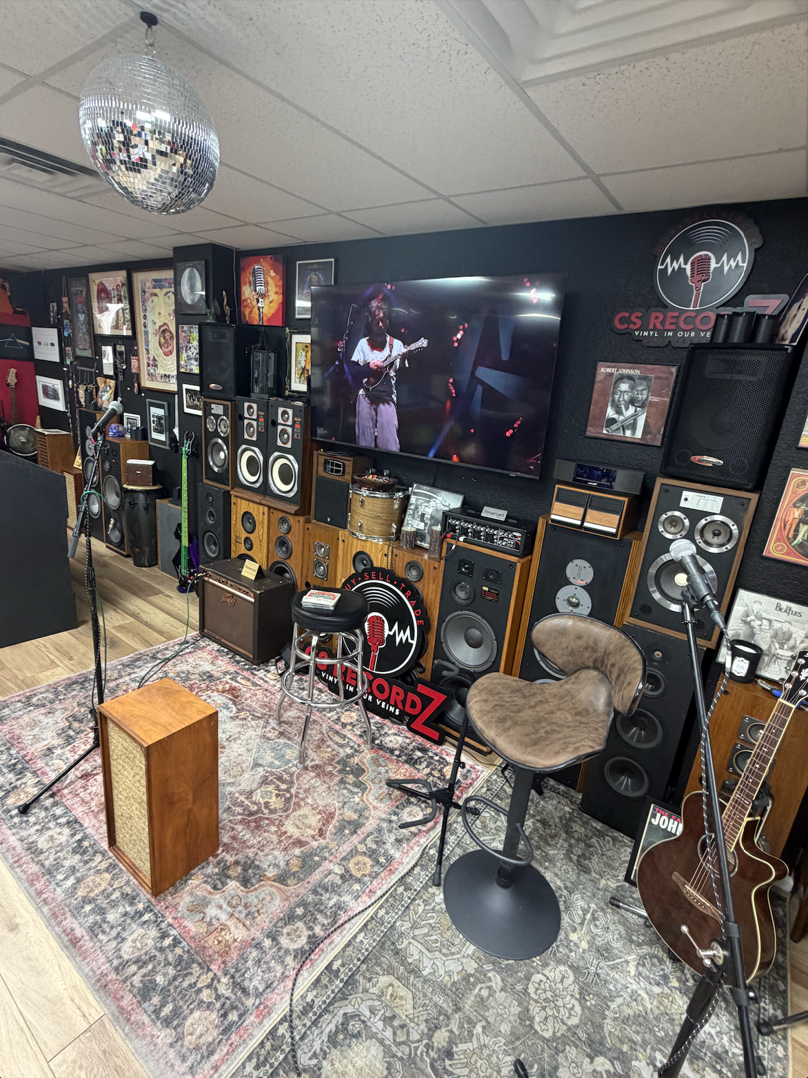 Stack of cassette tapes and CDs